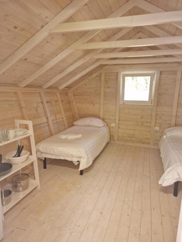 Postel nebo postele na pokoji v ubytování Fkk Adriatika in FKK Solaris Naturist Resort