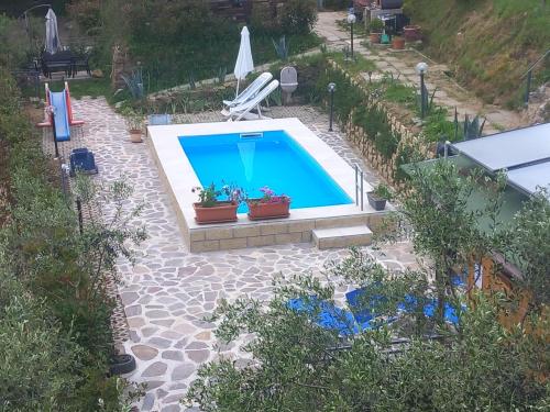 an overhead view of a swimming pool in a backyard at Il Podere di Massi in Barberino di Mugello