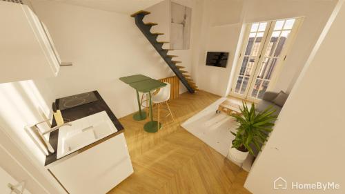 una vista aérea de una sala de estar con una escalera de caracol en Superbe Loft 2 niveaux Comédie Gare, en Montpellier