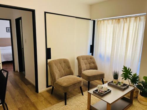 Et opholdsområde på Departamento confortable centro Wi Fi - cochera opcional