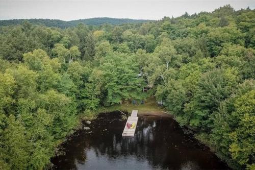 an aerial view of a bridge over a river at 3BR Rebecca Lakehouse with Fireplace Wifi and Dock in Oxtongue Lake