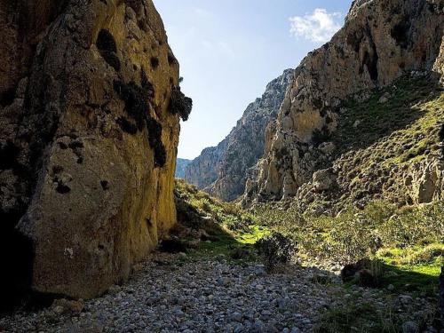 a view of a rocky canyon with a mountain at Luxury house Makry gialos 200m to the beach 6 pers in Makry Gialos