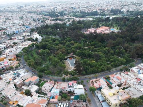 an aerial view of a city with a road at Suite Picchu Picchu in Arequipa