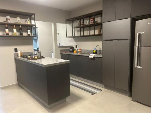 Dapur atau dapur kecil di BORA BORA RESIDENCE II Geminados 600 METROS DA EXPOVILLE