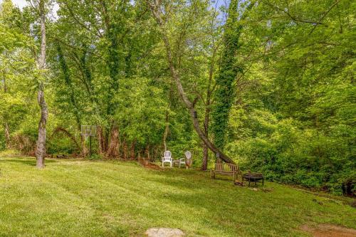 a park with two chairs and a basketball hoop at Waterfront Cabin 20 Mins to National Park & Massanutten! in Stanardsville