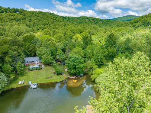 an aerial view of a house on a river at Waterfront Cabin 20 Mins to National Park & Massanutten! in Stanardsville