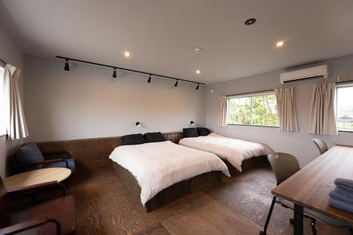 Tempat tidur dalam kamar di HOSTEL perch