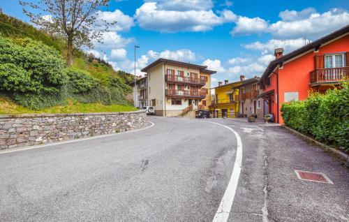 an empty street in a town with buildings at Awesome Apartment In Pezzoro in Lavone