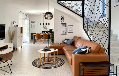 a living room with a couch and a table at Villa Morosini in Rovinj