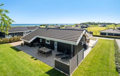 an overhead view of a small house with a patio at Three-Bedroom Holiday Home In Nordborg in Nordborg
