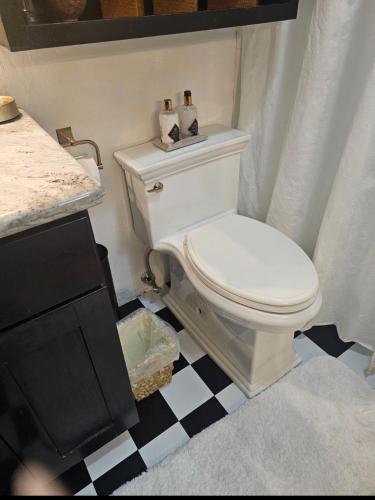 a bathroom with a toilet with two candles on it at Perfect Inside Downtown Aspen Location! Romantic 1300 ft, 4 Blocks or 396 m, to AJAX or Aspen Mountain in Aspen