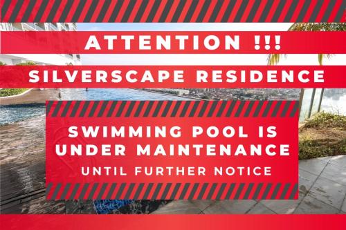 a sign for a swimming pool is under maintenance at Silverscape Deluxe Melaka by I Housing in Melaka