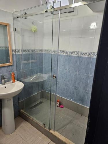 a bathroom with a shower and a sink at Le pacha appart au cœur de Rabat in Rabat