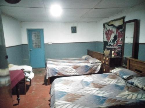 Katil atau katil-katil dalam bilik di Sweety Forest Villa