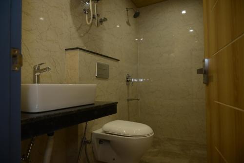 Vonios kambarys apgyvendinimo įstaigoje Saadhan Homestay