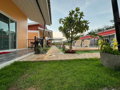 Jardin de l'établissement พัชรี รีสอร์ท ภูเก็ต Patcharee Resort Phuket