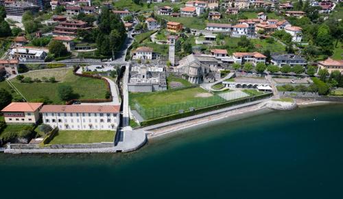 an aerial view of a house next to the water at Vecchia Filanda Musso 1A in Musso