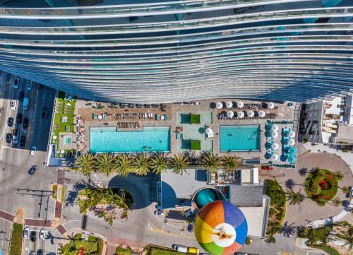 an overhead view of a large building with swimming pools at Lyfe Oceanview Resort Luxury 2 Bedroom Unit in Hollywood
