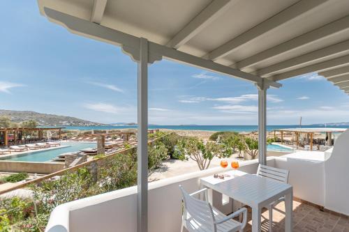 a view of the beach from the balcony of a villa at Golden Sand in Plaka