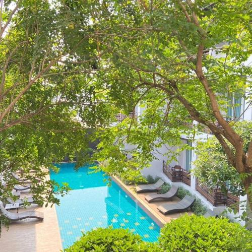 Bazén v ubytování Le Patta Resort & Hotel Chiang Rai nebo v jeho okolí