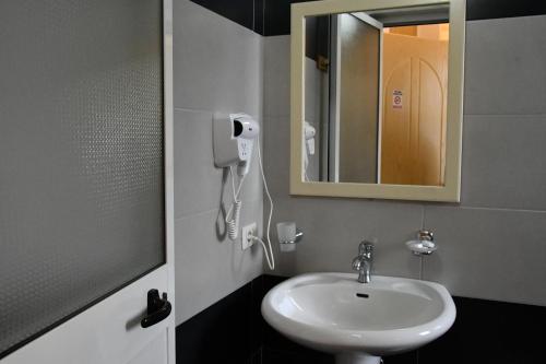 Kylpyhuone majoituspaikassa Elite Hotel
