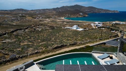 an aerial view of a villa with a swimming pool at Cabana Seaview Pool Villas w Night Security Guard, near Alemagou beach in Elia