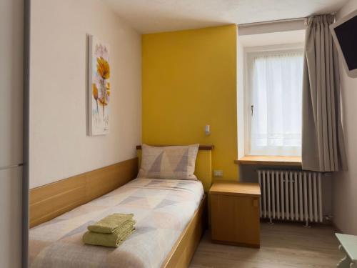 Postel nebo postele na pokoji v ubytování Appartamenti LITEGOSA casa vacanza 1