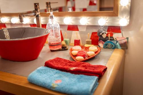 a kitchen counter with a bowl of eggs and a sink at La Bella Vista in Curel