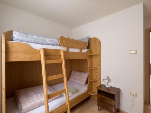 Poschodová posteľ alebo postele v izbe v ubytovaní Appartamento Litegosa 2