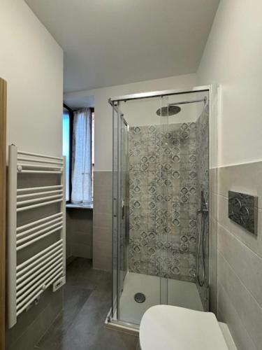 a bathroom with a shower and a toilet at La Foce in Savona