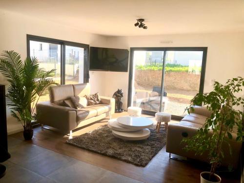 Coin salon dans l'établissement House of SPA Courseulles Sur Mer