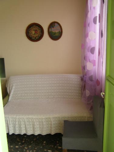 Ένα ή περισσότερα κρεβάτια σε δωμάτιο στο Doll house next to the sea