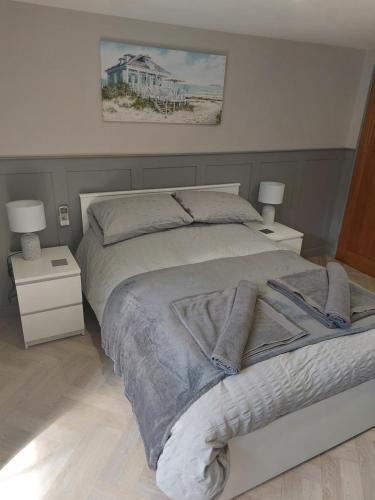 Ένα ή περισσότερα κρεβάτια σε δωμάτιο στο The Cabin