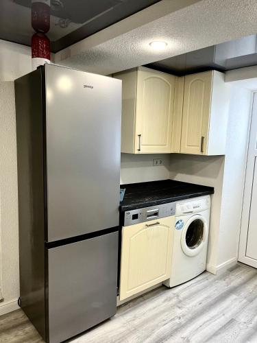 Kuchyň nebo kuchyňský kout v ubytování Linger House