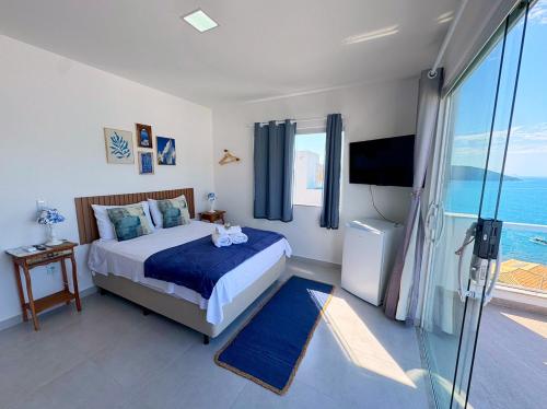 Posteľ alebo postele v izbe v ubytovaní Olímpia - Terraço Mykonos com piscina privativa - Casa Grega