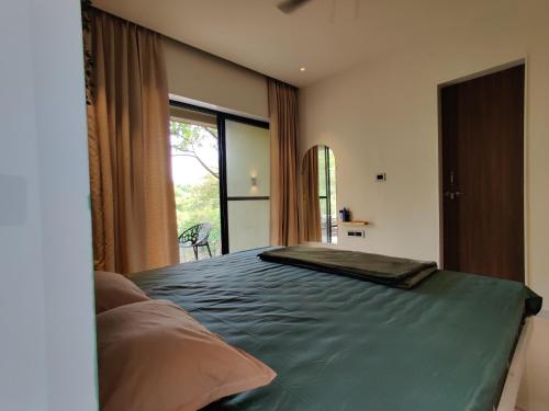 Ένα ή περισσότερα κρεβάτια σε δωμάτιο στο The Marigold Villa