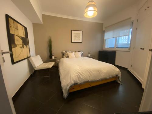 Postel nebo postele na pokoji v ubytování Apartamento - Parque do Jamor