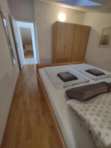 Cama ou camas em um quarto em Apartman East Side sea view