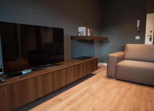 TV o dispositivi per l'intrattenimento presso Dyrrhachium Elegance - Stylish Apartment City Center