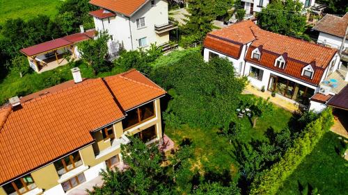 an overhead view of a house with red roofs at Докторската къща in Sapareva Banya