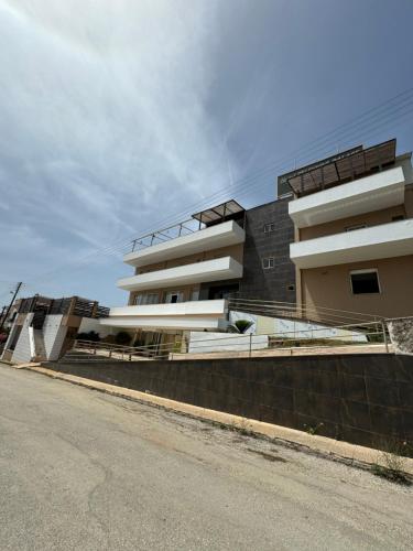 a building on the side of a street at Selefkos Palace in Igoumenitsa