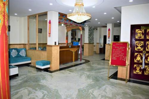 a lobby with a floor covered in water at zoz star leh in Leh
