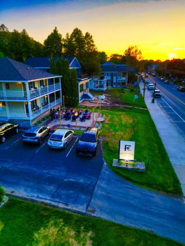 an aerial view of a parking lot in front of a building at Fresh Coast Motel in Fish Creek