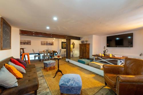 a living room with a couch and a table at Donna Fortuna in Catania
