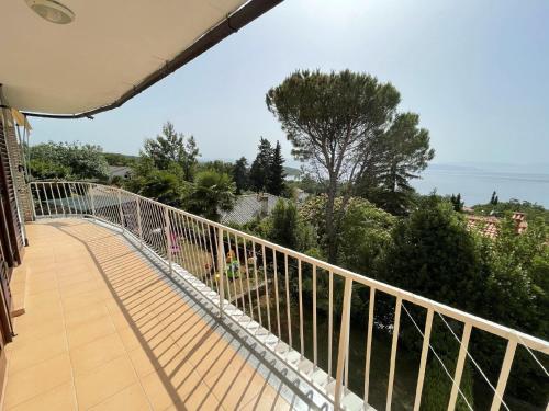a balcony of a house with a view of the ocean at Ferienwohnung für 4 Personen ca 56 qm in Njivice, Kvarner Bucht Krk in Njivice
