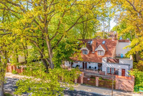 an aerial view of a house with a tree at Willa DanSar in Rewal