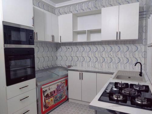 Η κουζίνα ή μικρή κουζίνα στο Belle Villa
