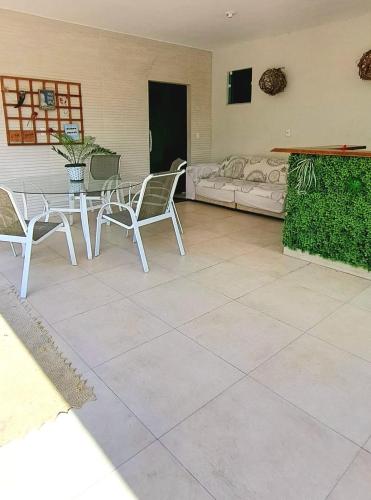 Ruang duduk di Casa com piscina e muita tranquilidade