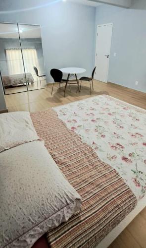 Katil atau katil-katil dalam bilik di Casa com piscina e muita tranquilidade