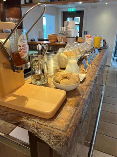 a counter with a counter top with food on it at Forsthaus am Möhnesee in Möhnesee